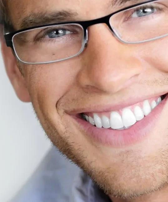 Patient smiling after a visit to Lehi Dental Center