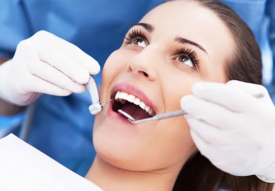 girl getting dental work done